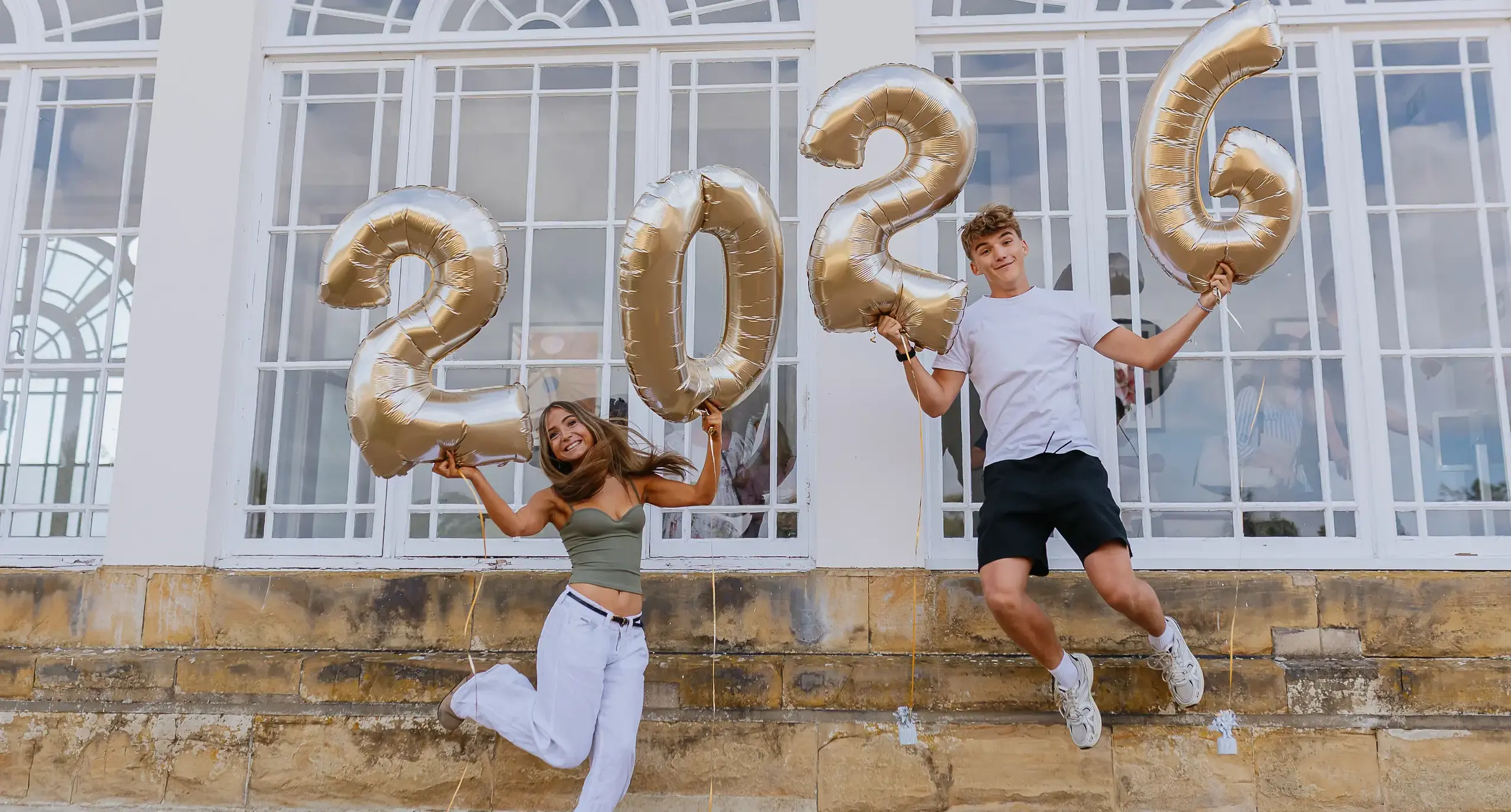 Radnor House Students Celebrating their GCSE results with 2026 balloons
