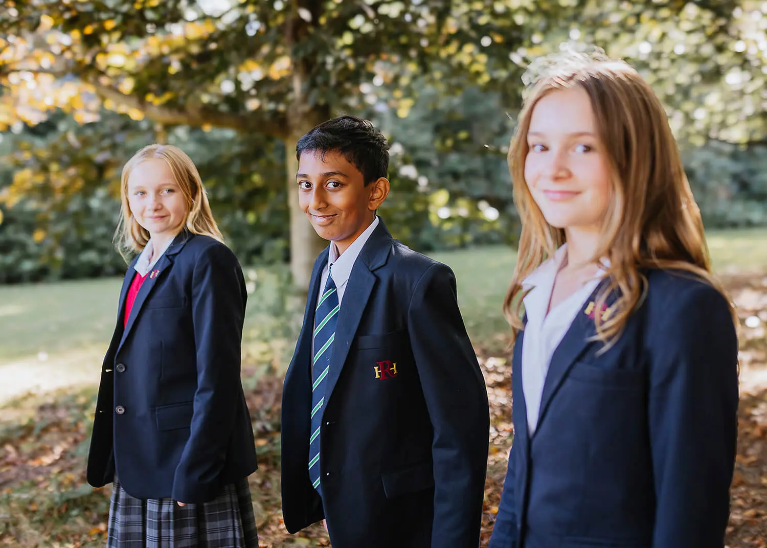 Pupils walking in the school grounds at Radnor House Sevenoaks
