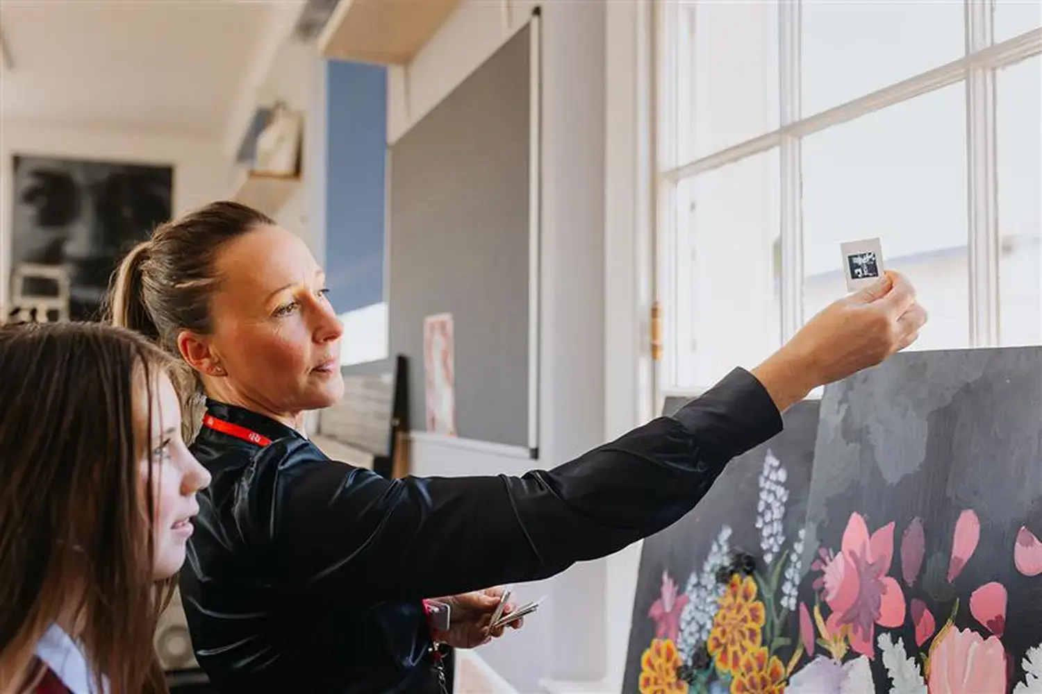 Senior Pupil in Art room with teacher at Radnor House Sevenoaks
